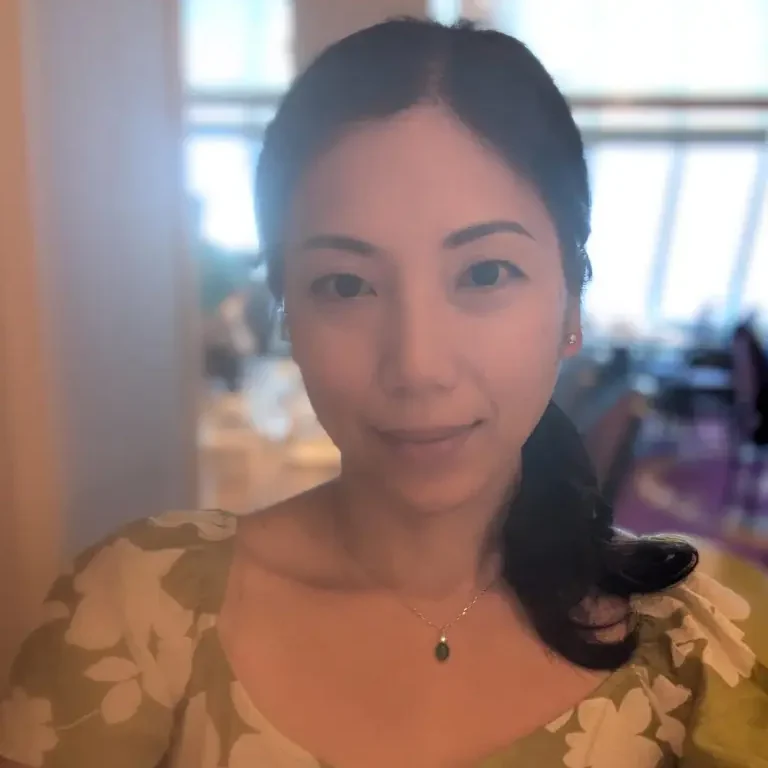 Woman smiling indoors